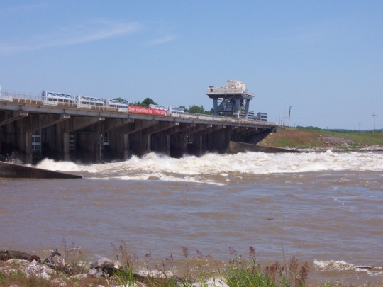 Low Sill Structure of the Old River Control Complex with water roaring through the open gates