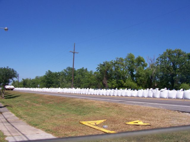HESCO Bags installed along Highway 70 to prevent backwater flooding from Lake Palourde into Morgan City.
