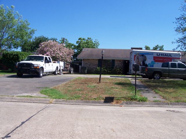 Moving truck and trailer being used to relocate possessions from a home in an area of Morgan City vulnerable to back water flooding.