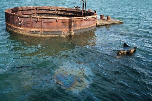 Oil drops leaking from the USS Arizona. Photo by James G. Howes, November, 2005 Oil drops leaking from the USS Arizona. Photo by James G. Howes, November, 2005